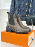 Louis Vuitton monogram ankle chelsea boots with black elastic sides and tread sole