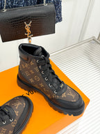 Monogram lace-up boots, dark brown upper with black toe cap and rubber sole