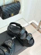 Chanel dark quilted slide sandals with double velcro straps and gold CC charms