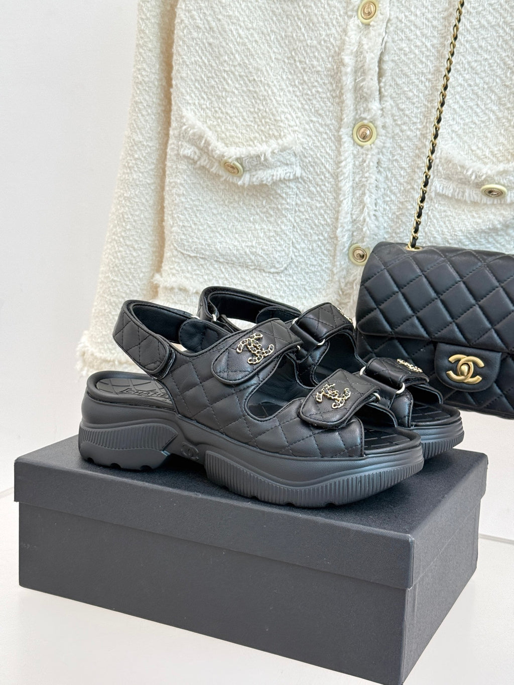 Chanel quilted leather slide sandals with double straps and gold CC emblems