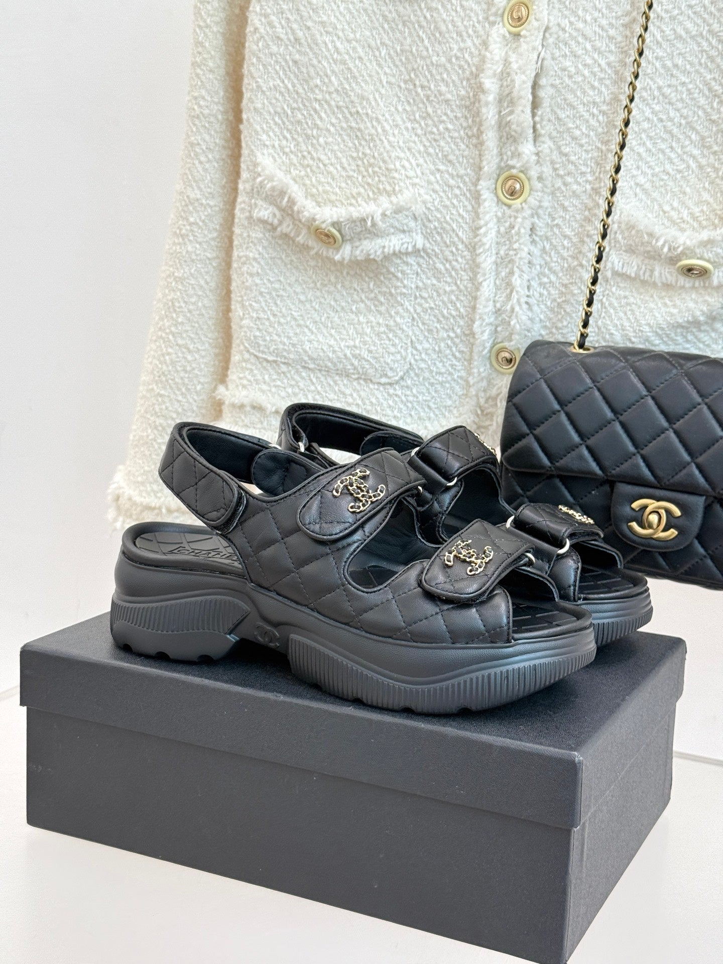 Chanel quilted leather slide sandals with double straps and gold CC emblems