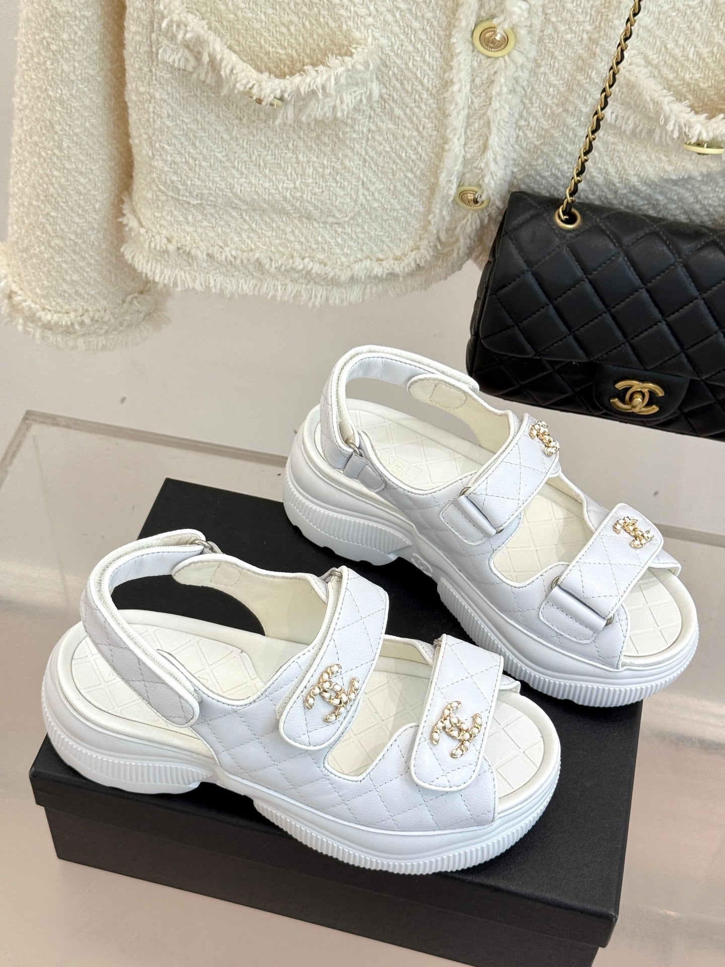 Chanel ladies white leather sandals with gold logo buckles and raised platform sole