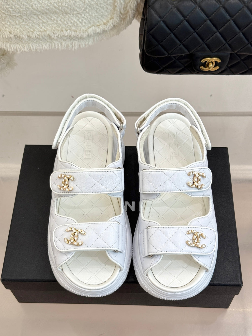 Chanel ladies white leather sandals with two gold logo buckles and thick rubber sole
