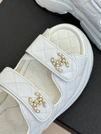 Chanel ladies white leather sandals with gold logo ornaments on two hook straps