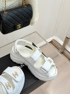 Chanel ladies white leather platform sandals with gold logo buckles and grippy sole