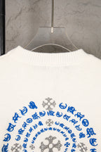 White knit sweater back with large circular blue and gray design