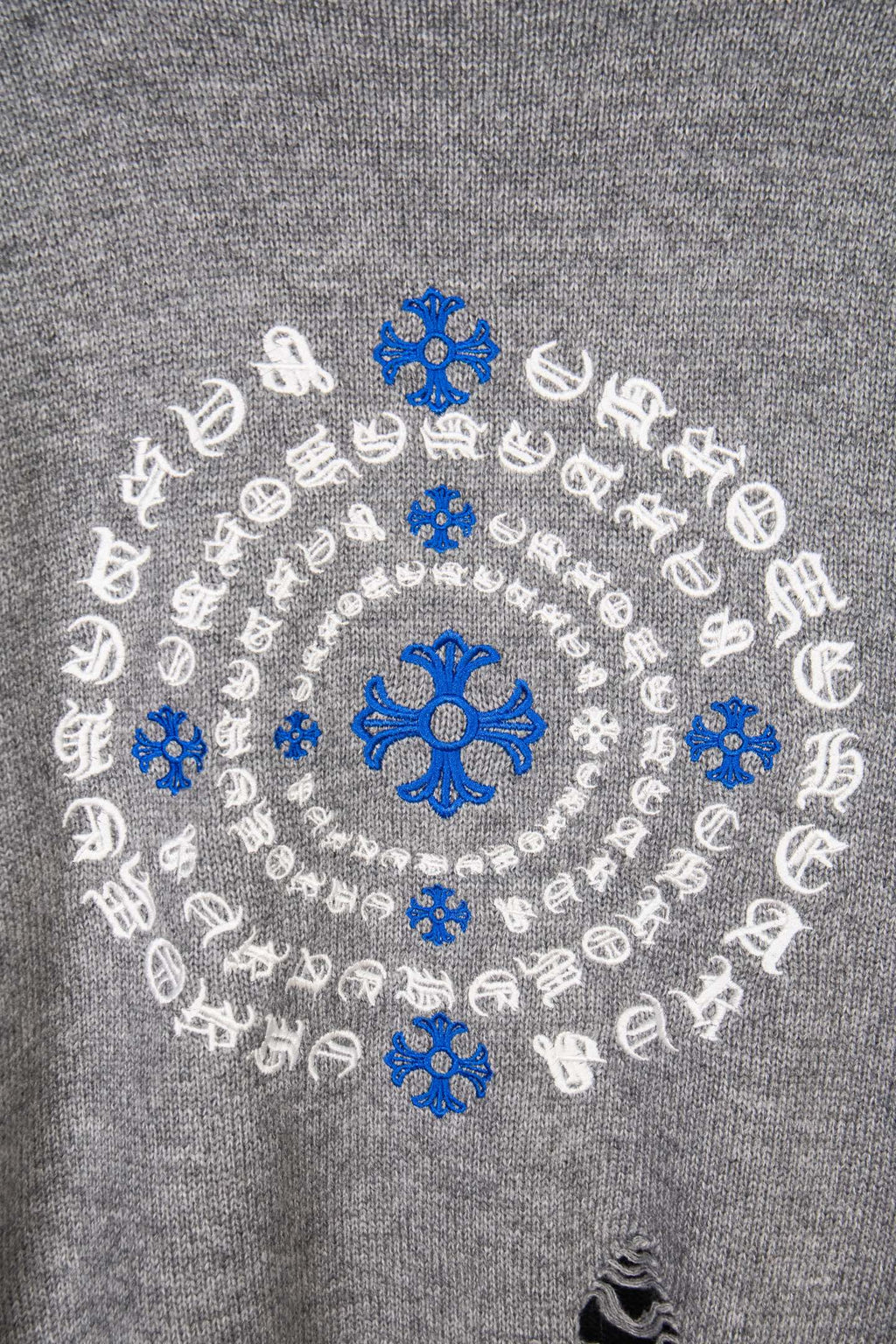 Grey knit sweater back embroidery with blue snowflakes and white pattern