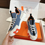 Hermes unisex sneakers, blue denim and white panels, black heel tabs, white lace-up