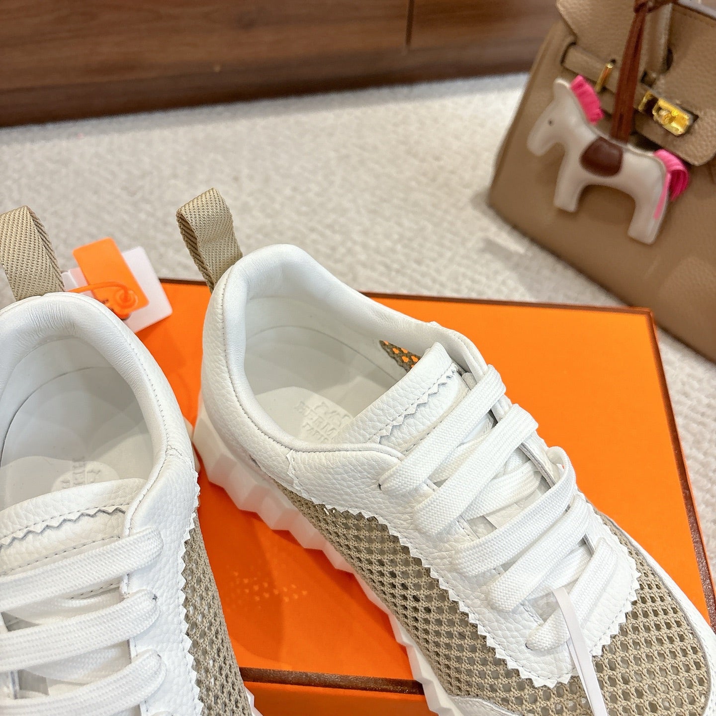 Hermes unisex sneakers, upper and laces detail with tan mesh side stripe and padded collar.