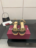Gucci ladies platform sandals with leopard-print straps and gold-tone hardware