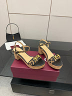 Gucci ladies platform sandals with leopard-print T-strap and cork-style sole