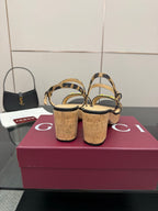 Gucci ladies platform sandals with leopard-print ankle straps and cork-style wedge heel