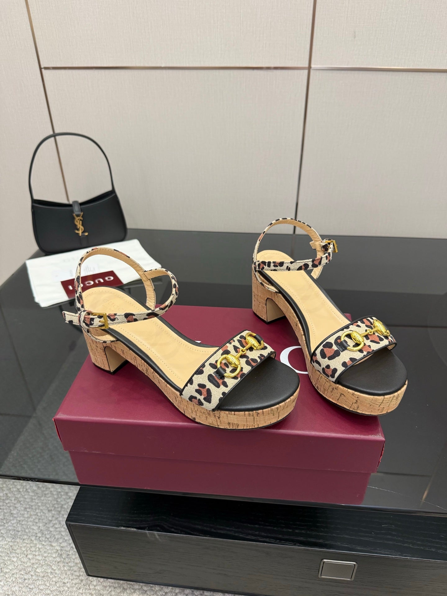 Leopard-print heeled sandals with ankle strap and cork platform