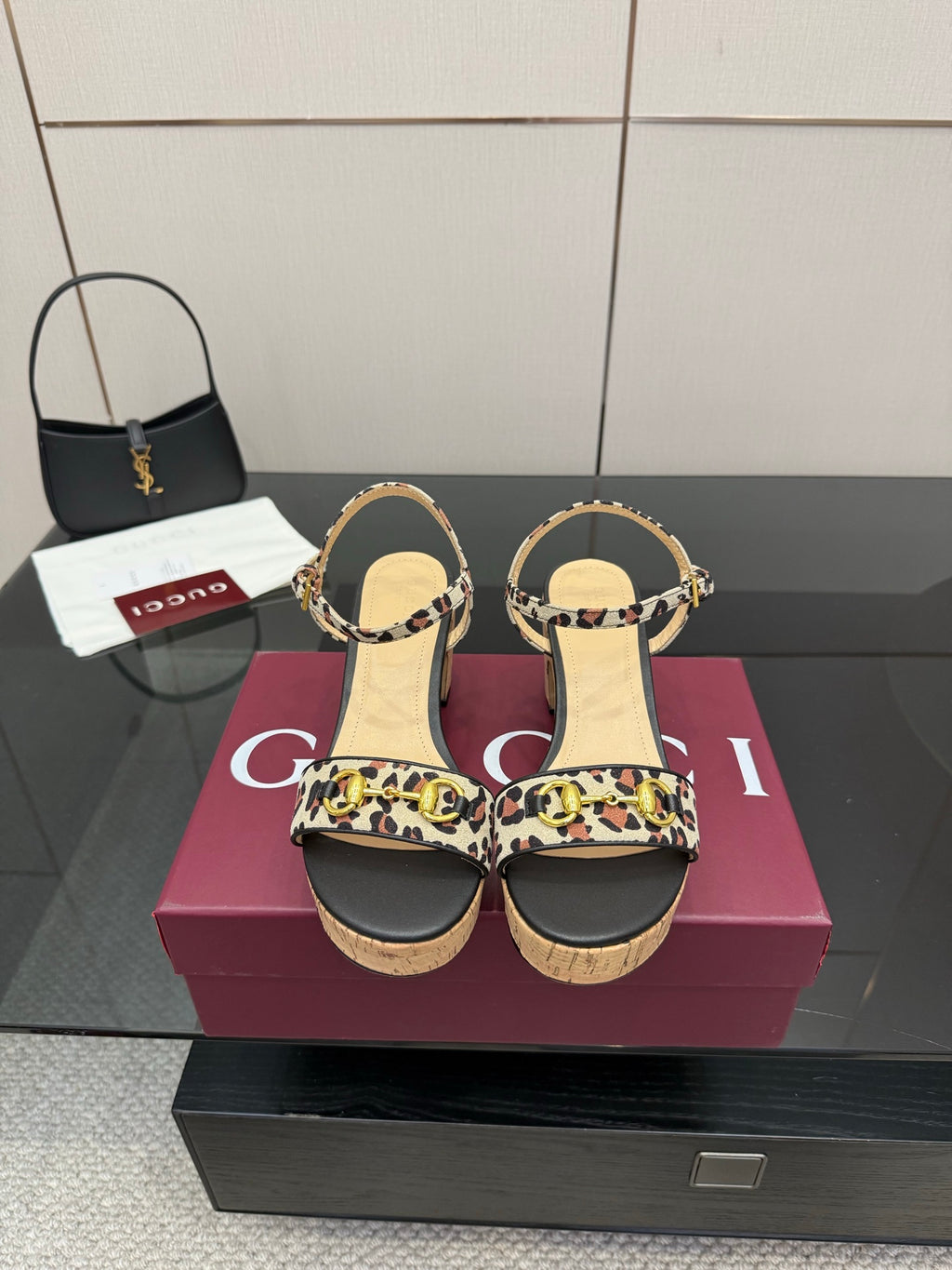 Leopard-print wedge sandals with ankle strap and cork heel