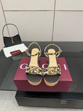 Leopard-print wedge sandals with ankle strap and cork heel