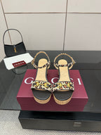 Leopard-print wedge sandals with ankle strap and cork heel