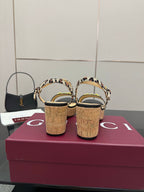 Leopard-print wedge sandals with cork heels, viewed from the back