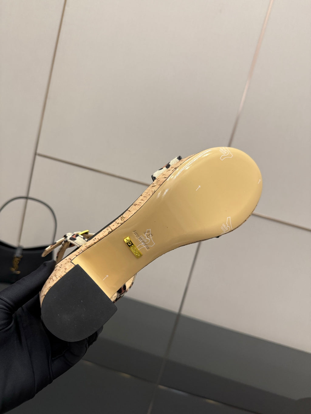 Leopard-print wedge sandal outsole and footbed, shown close-up