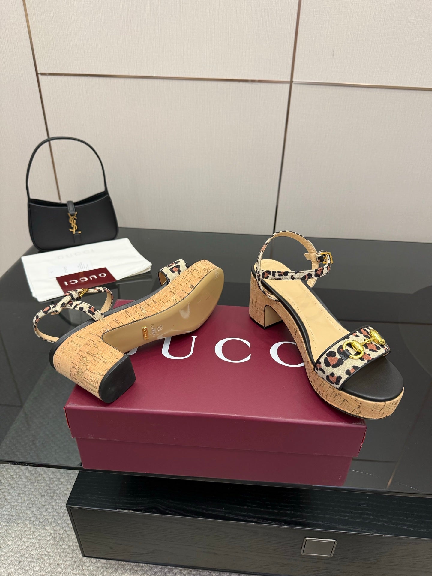 Leopard-print wedge sandals showing side profile and cork platform