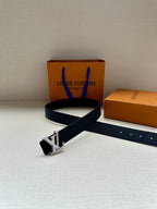 Louis Vuitton belt, dark leather with silver-tone LV buckle and punched holes