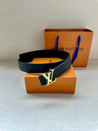 Louis Vuitton belt with dark textured leather strap and gold-tone LV buckle