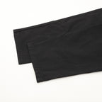 Dark pants with folded hem and inner waistband seam