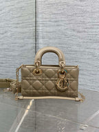 Beige quilted handbag with gold-tone rings and chain shoulder strap