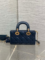 Dior mini handbag in navy quilted leather, top handles and adjustable strap