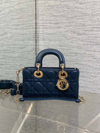 Dior mini handbag in navy quilted leather with gold-tone hardware and shoulder strap