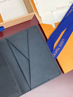 Small Louis Vuitton leather card holder, interior panels with stitched edges