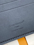 Louis Vuitton small bag, dark blue textured leather with embossed logo and stitching
