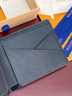 Louis Vuitton small bag, dark blue leather interior with fold pocket and card slots