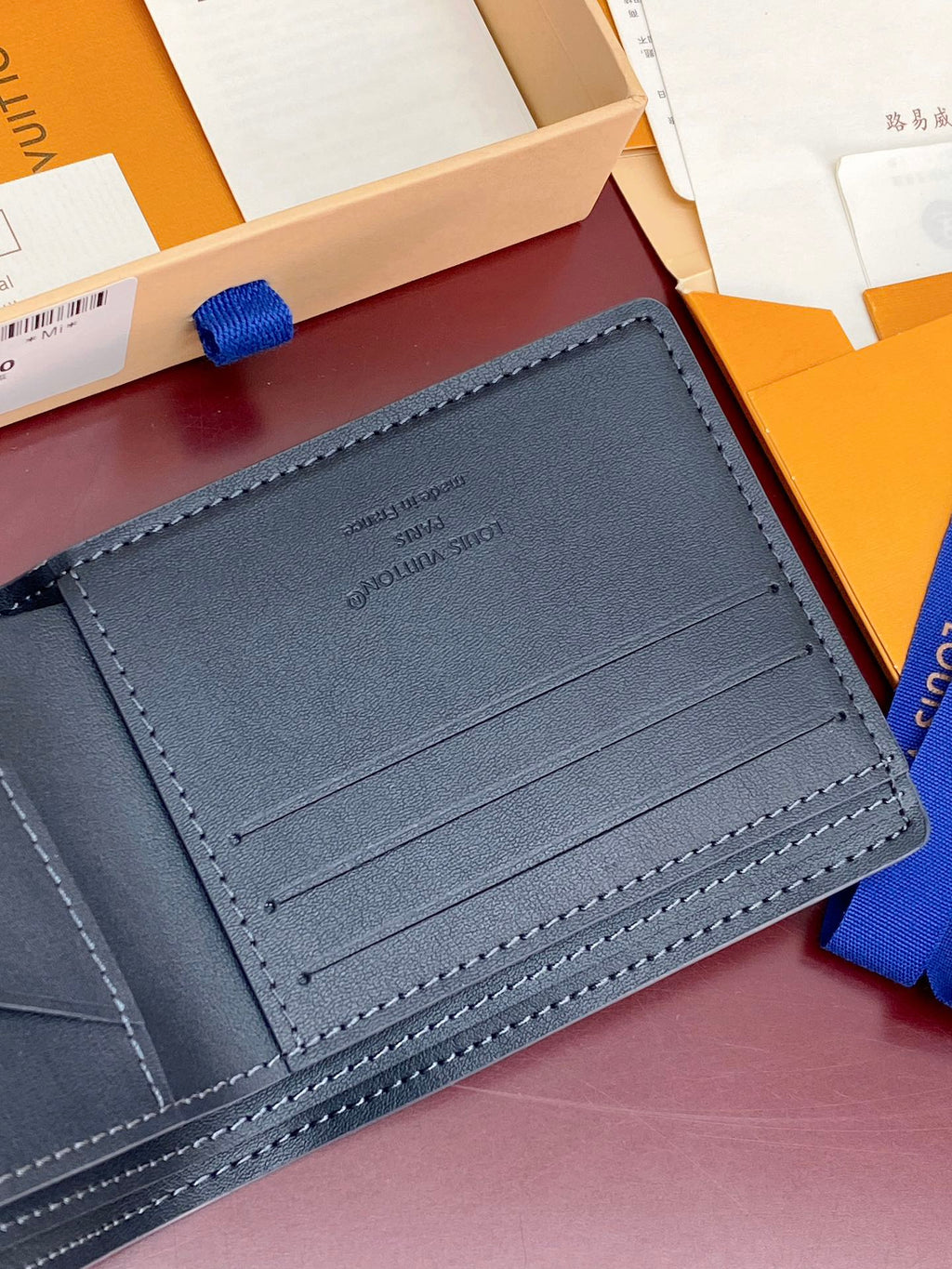 Louis Vuitton small bag, dark blue leather card holder with multiple interior slots