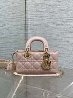 Pink quilted Dior bag with handles and adjustable shoulder strap, gold hardware
