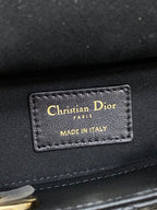 Dior handbag interior label with text Christian Dior, PARIS, and MADE IN ITALY