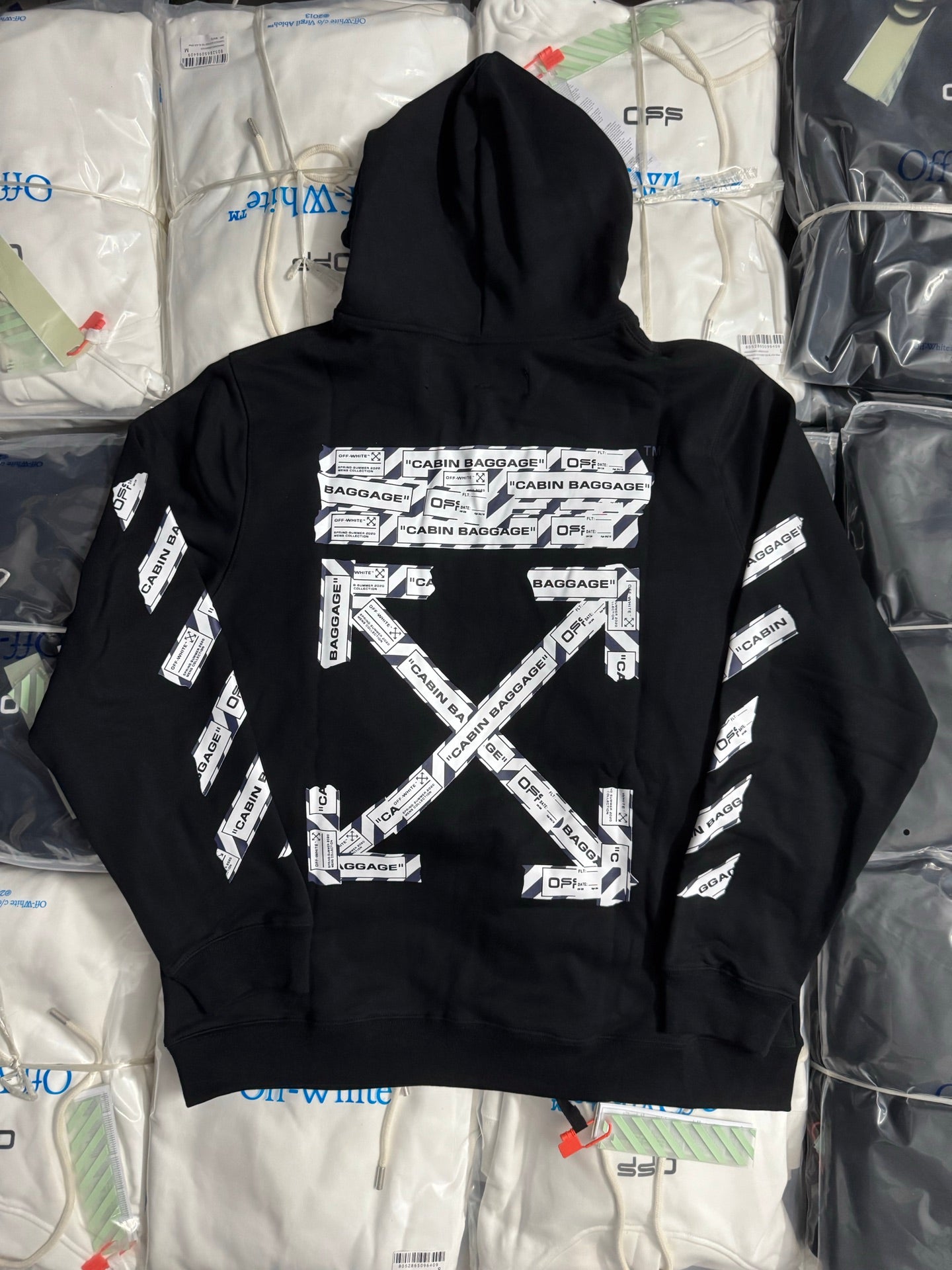 Black hoodie back with large CABIN BAGGAGE graphic and hood