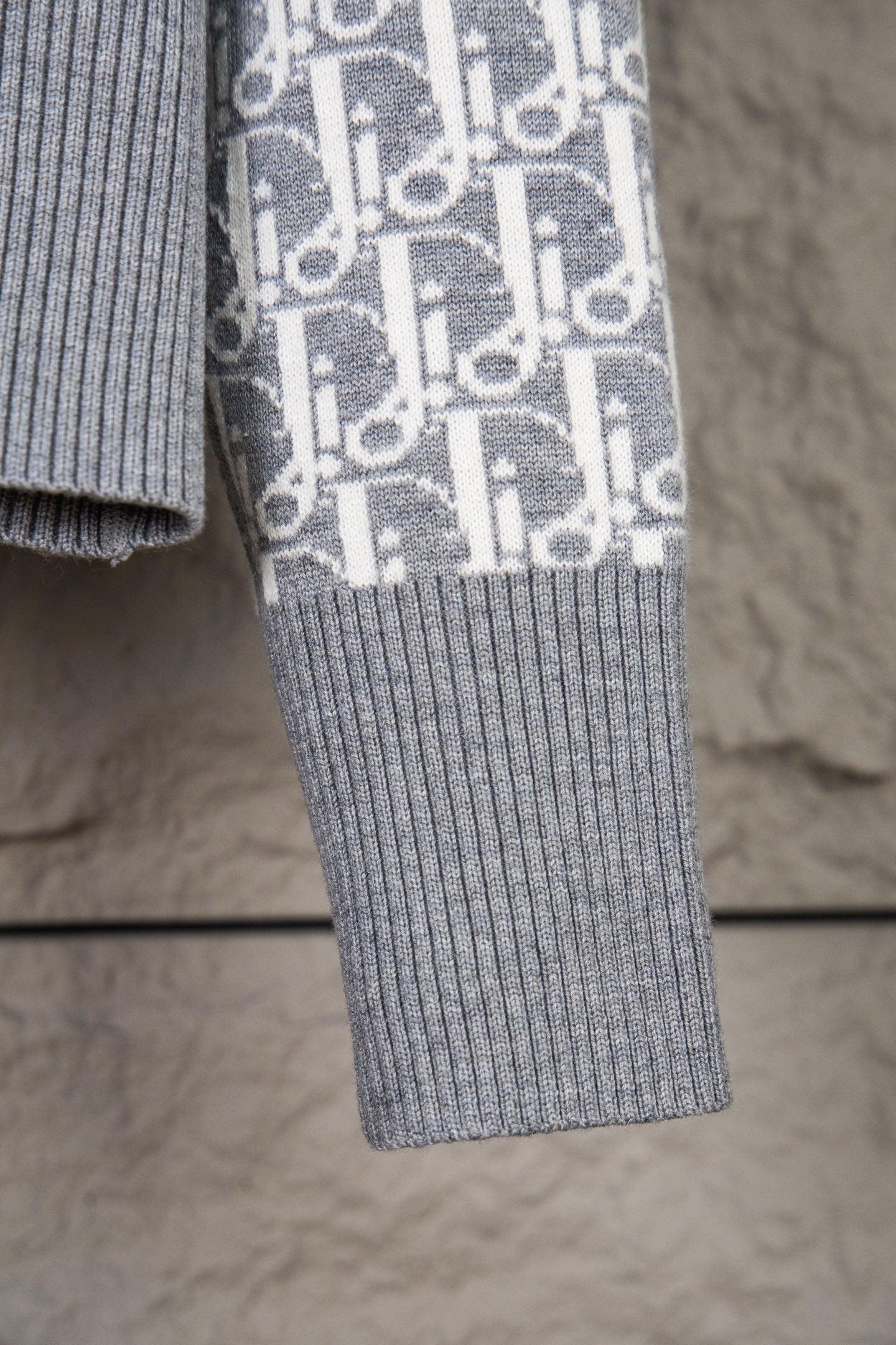Grey knit shorts with ribbed hem and allover monogram side panel