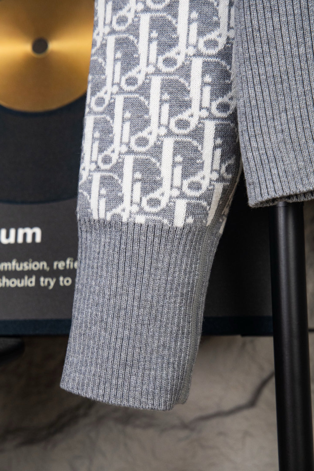 Grey rib-knit sweater sleeve and matching shorts with monogram panel