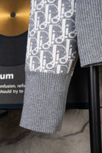 Grey rib-knit sweater sleeve and matching shorts with monogram panel