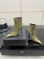 Pair of ladies’ olive suede ankle boots with pointed gold-tone toe caps and side zippers