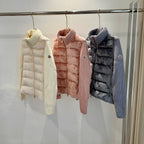 Long puffer jackets with knit turtlenecks in cream, blush pink, and dark navy.