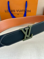 Louis Vuitton belt detail: dark blue leather strap with stitched edge and LV buckle