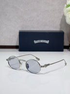 Round metal glasses with silver frames and light blue tinted lenses