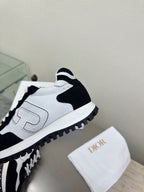 White and black lace-up sneakers with side logo and contrast stitching