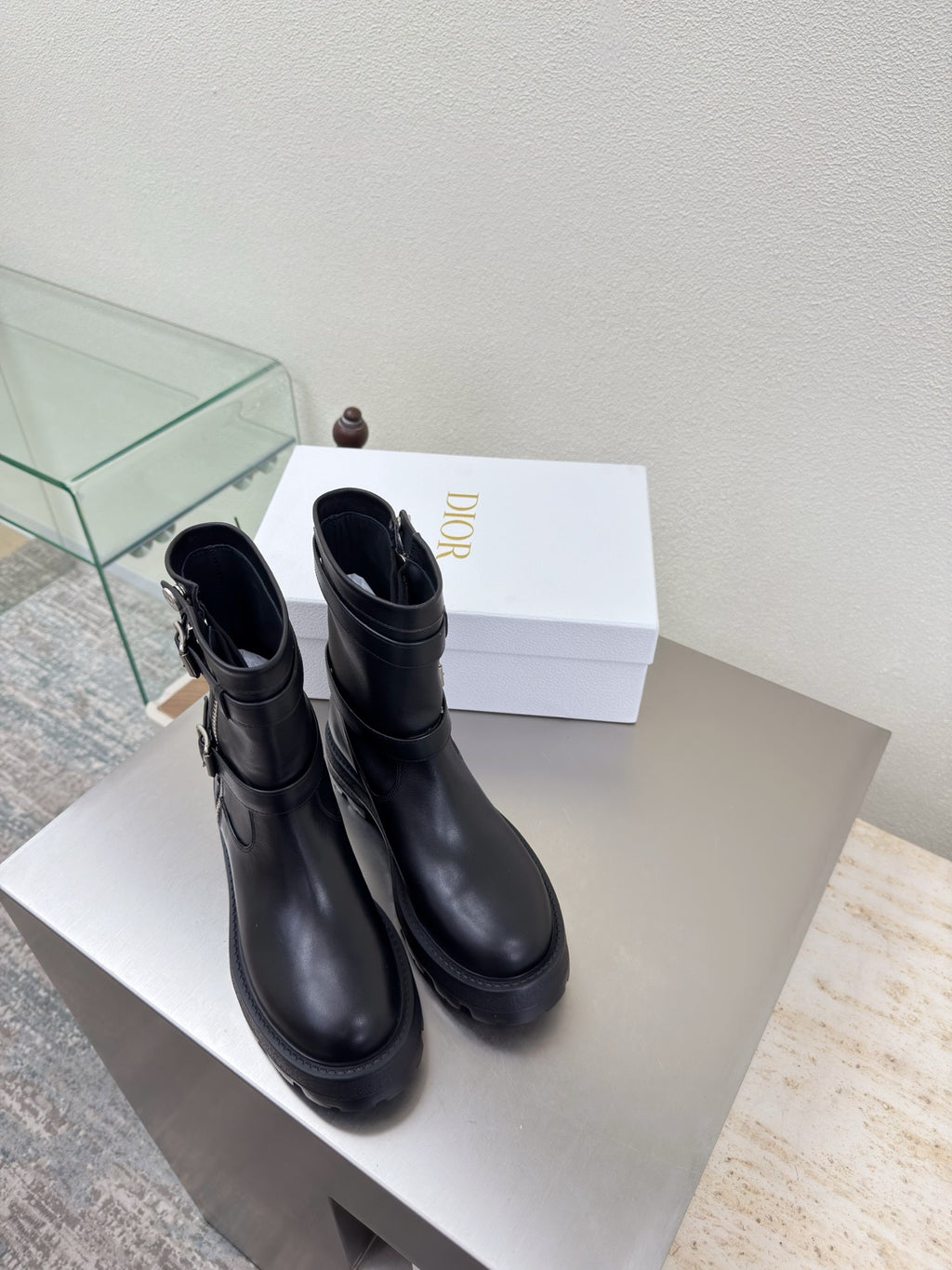 Black leather ankle boots with side zipper and chunky lug sole