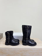 Black mid-calf leather boots with buckles and rugged block heel sole