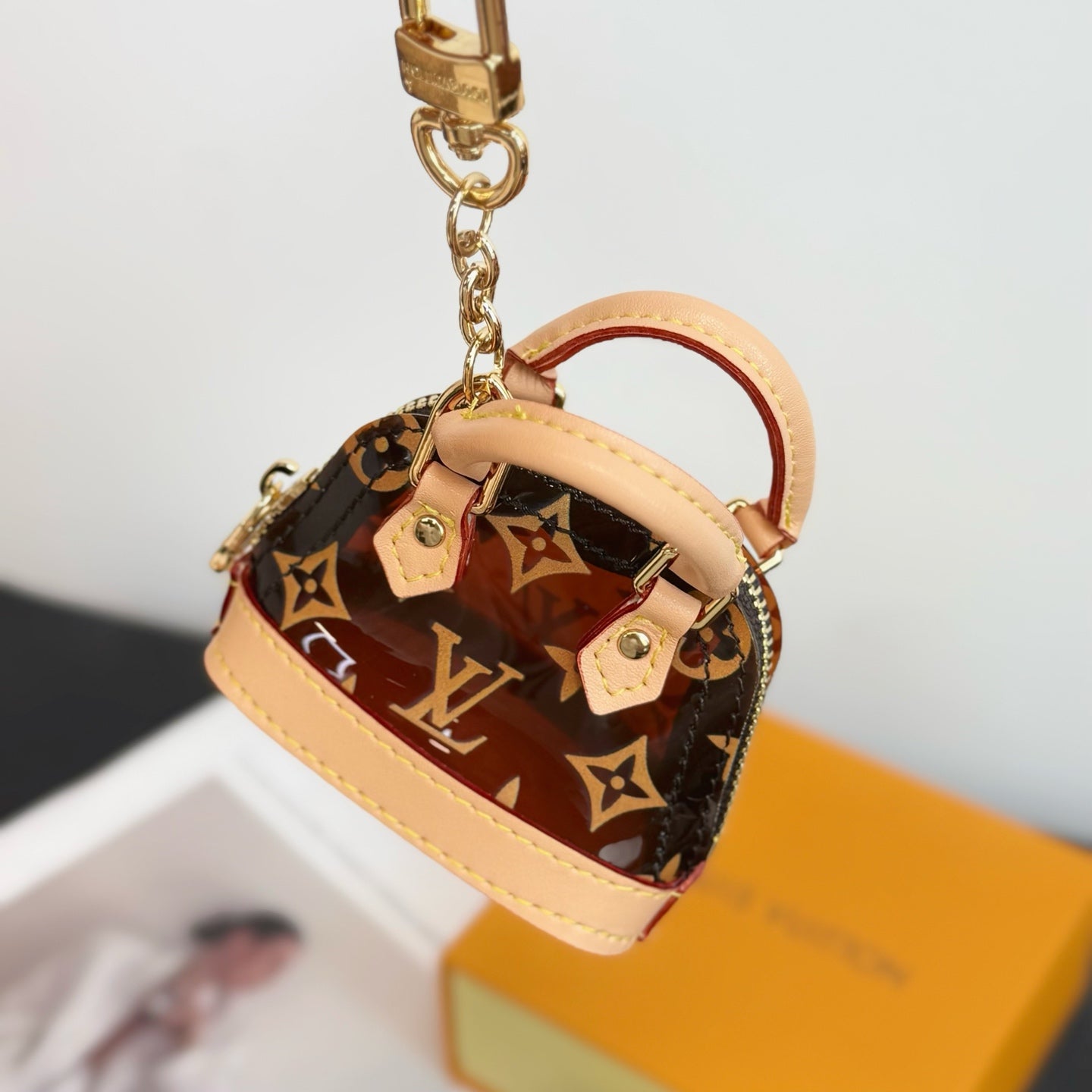 Louis Vuitton monogram mini handbag keyring charm with gold clasp and pink trim