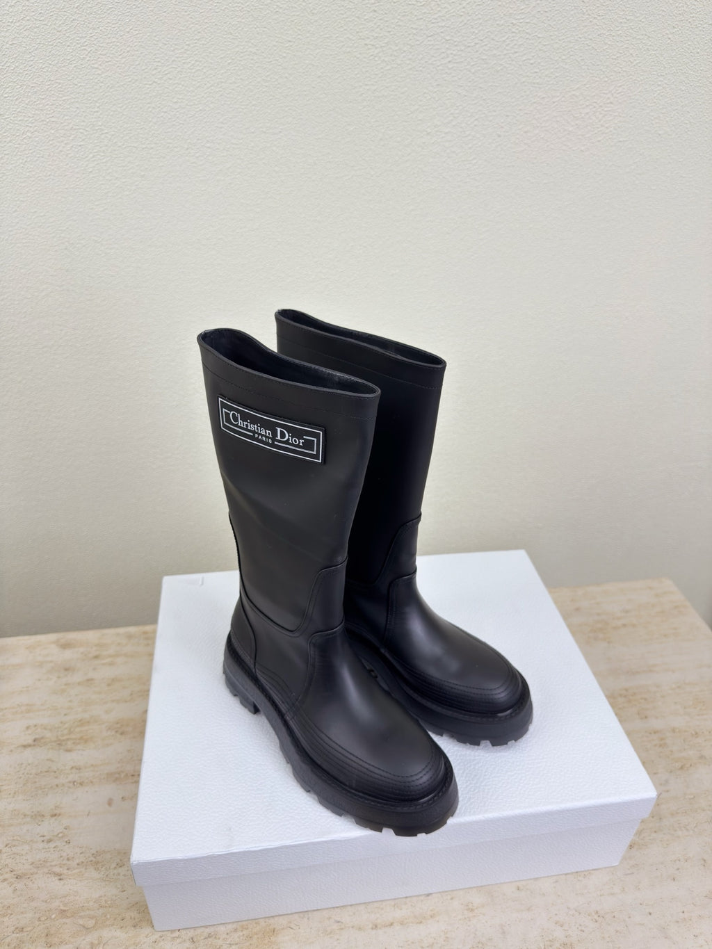 Women's dark knee-high boots, Christian Dior logo on shaft, lug sole