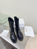 Dior ladies mid-calf leather boots, dark with pull-on design and chunky rubber sole