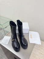Dior ladies mid-calf leather boots, dark with pull-on design and chunky rubber sole